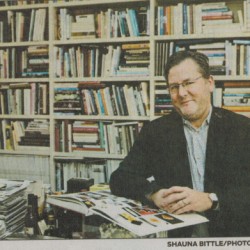 Someone Else with Shelves of Cookbooks Charlie+Trotter+and+his+books1