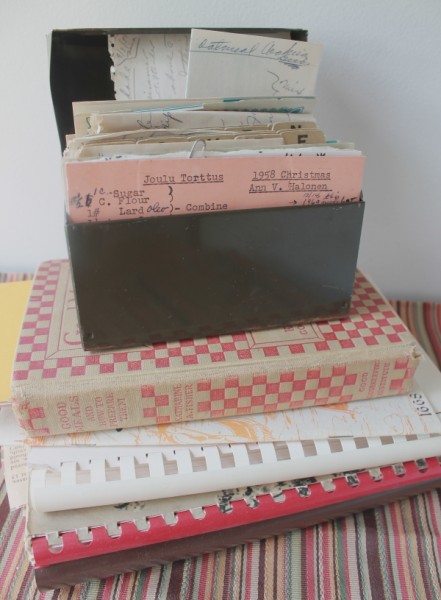 Aunt Ann recipe box atop cookbooks