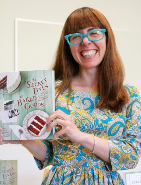 Baked Goods author holding book facing camera