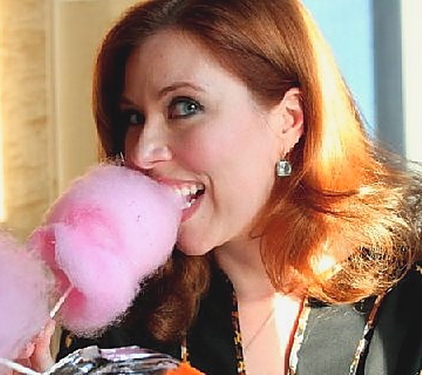 Kristina eating cotton candy at Four Seasons