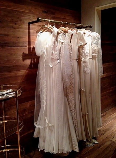 Kara wedding dresses on hangers