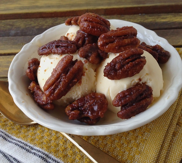 Candied pecans with ice cream before eating