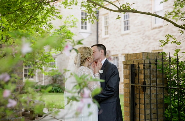 Wedding kissing in garden