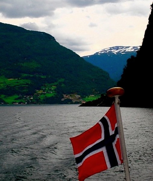 Norway on fijords with flag