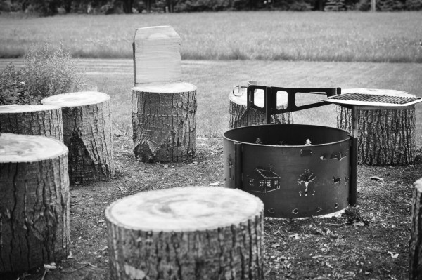 Backyard log chairs in black and white