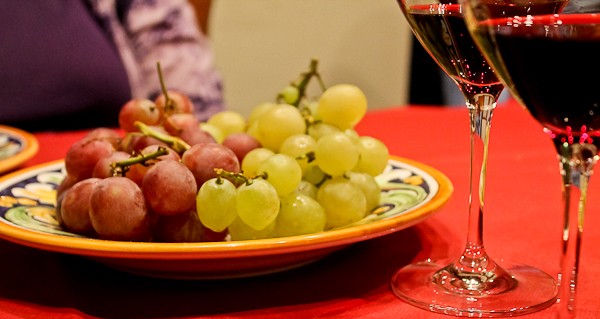 Butera grapes and wine on table