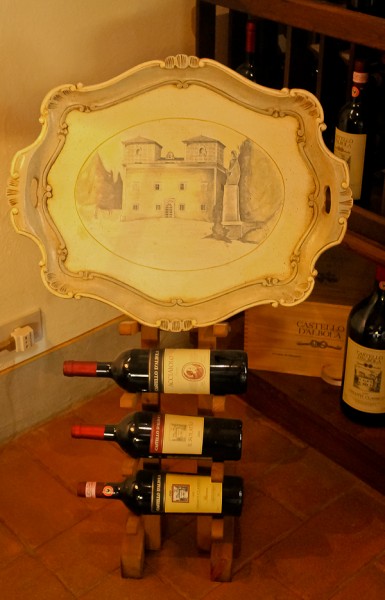 Tuscany wines on stand with tray