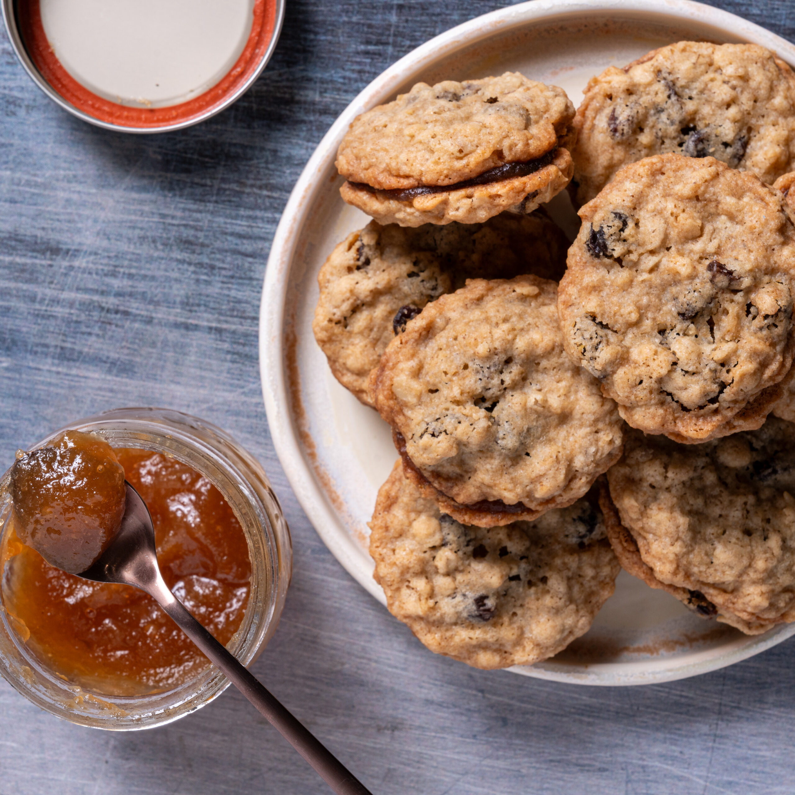 Oatmeal-Raisin Sandwich Cookies with Apple Butter - The Culinary Cellar